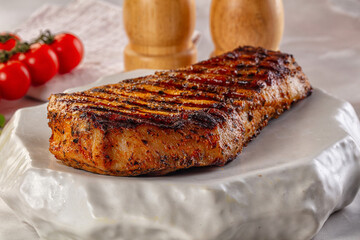 Grilled pork steak with bone