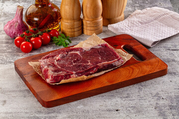 Gourmet raw rib eye steak