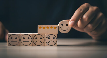 Hand placing a happy emoticon atop a five-star rating, improving customer satisfaction.