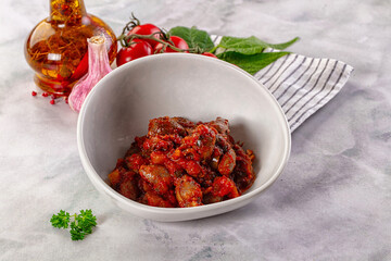 Roasted chicken hearts with vegetables