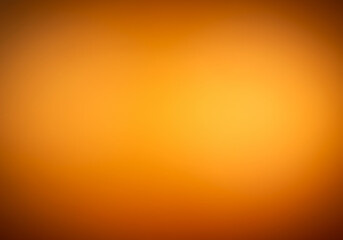 Fototapeta premium Defocused blur background with orange to yellow gradient, texture like morning sunlight, optimistic and bright tone, suitable for motivational themes or morning routines