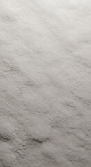 Obraz premium A textured gray background with a rough surface