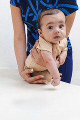 Physical therapist guides a young child through rehabilitation exercises to boost physical function...