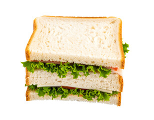 Sandwich on black background cut in half