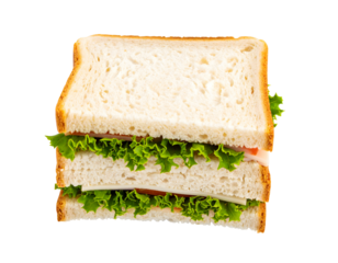 Sandwich on black background cut in half