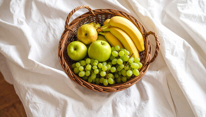 "Fruit Basket with Apples Bananas Grapes and Pears on Linen Cloth – Top View Natural Setup"