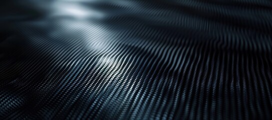 Dynamic waves of dark carbon fiber texture surface with light reflection