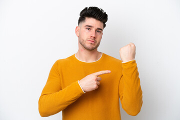 Young caucasian man isolated on white background making the gesture of being late