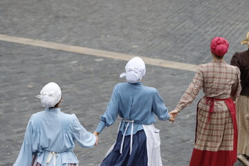 group of people holding hands together