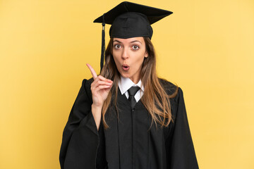 Young university graduate isolated on yellow background intending to realizes the solution while...