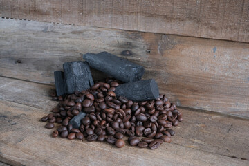 Coffee beans on a wooden background