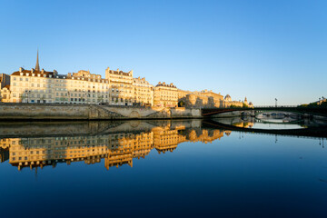The Quai des Fleurs and Arcle bridge in the 4th arrondissement of Paris city