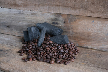 Coffee beans on a wooden background