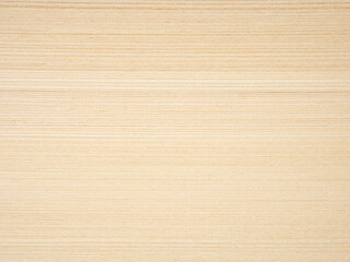 Subtle beige tones ripple through the fine lines of this delicate ash wood veneer surface.