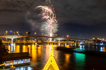 The blurred background of fireworks (light trails) is beautiful at night, seen in the New Year holidays, Christmas events, for tourists to take pictures during public travel.