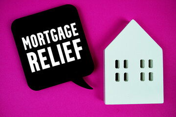 Mortgage Relief text with house model on pink background