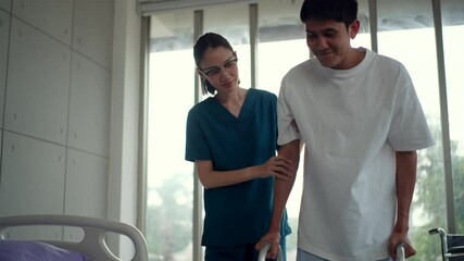 Doctor female physical therapist assists a patient with mobility aids
walking therapy. Nurses take care support patient healthcare,
rehabilitation. Insurance treatment services.