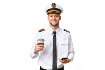 Airplane pilot man over isolated background holding coffee to take away and a mobile