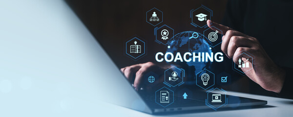 Business coaching concept with digital icons and hands interacting over laptop in modern workspace...