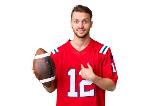 Young caucasian man playing rugby over isolated chroma key background with surprise facial expression