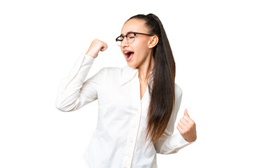Young Arabian woman over isolated chroma key background celebrating a victory