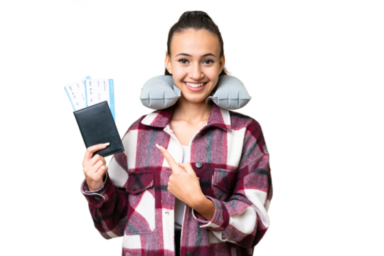 Young Traveler woman holding a passport over isolated chroma key background pointing to the side to present a product