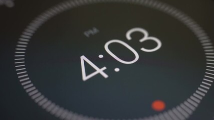 Smooth timelapse of a digital clock showing seconds passing. Perfect for time, technology, or deadline concepts. 4K resolution.