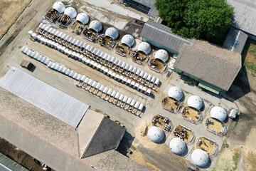 Cows livestock with igloos and individual boxes for calfs. Aerial view