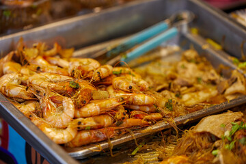 Close-up view of steamed shrimp potted with vermicelli