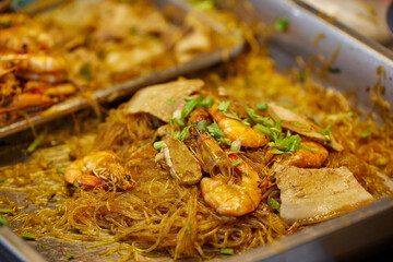 Close-up view of steamed shrimp potted with vermicelli