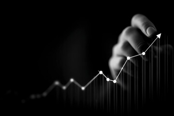 Hand draws glowing upward trending financial graph with data points against dark background