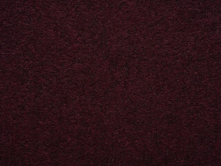 A deep plum enigma, this felt surface captivates with its rich, luxurious texture and a hint of...