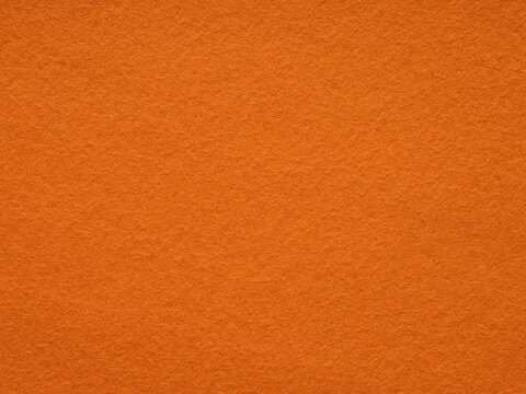 Burnt orange felt texture embodies the warmth of autumn, stimulating a sense of creativity and energy