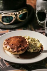 Steampunk-Themed Meat Pie with Mashed Potatoes and Skull Decor


