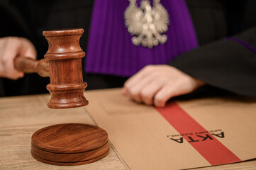 A Polish judge announces his verdict in the courtroom.