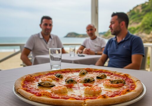 young people with pizza on sea side