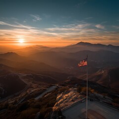 Serene Sunset Over Mountains with American Flag at Scenic Lookout
