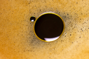 Morning Coffee Infused with Olive Oil for a Healthy, Energizing Start, macro, close up. 