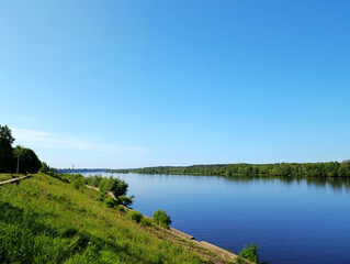 Volga river seen from the embankment in a small town Kimry in Tver Region, Russia. Forest on the other river bank