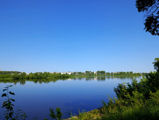 Volga river seen from the embankment in a small town Kimry in Tver Region, Russia. Forest on the other river bank