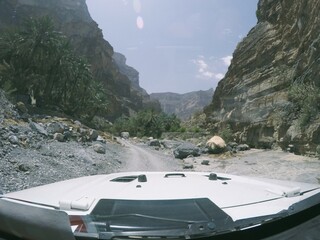 Driving through a Wadi while travelling through Oman. 