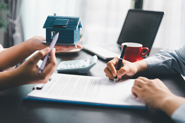 Woman real estate sale agent, client after signing agreement contract real estate with approved...
