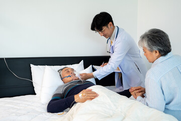 scene of doctor checking bedridden patient symptom. illness senior suffer from infectious disease....