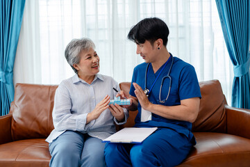 senior woman consult supplement medicine vitamin and drug instructed by physiotherapist. home...
