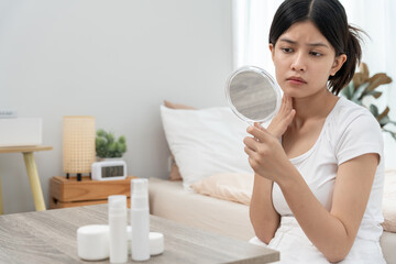 Young woman asian are worried about faces Dermatology and allergic to steroids in cosmetics....