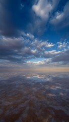 Fototapeta premium Salt desert fully covered in shallow water at sunset