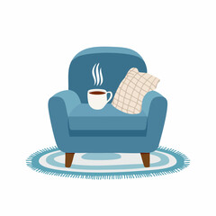 Cozy corner with a soft armchair and a steaming mug on a woven blanket