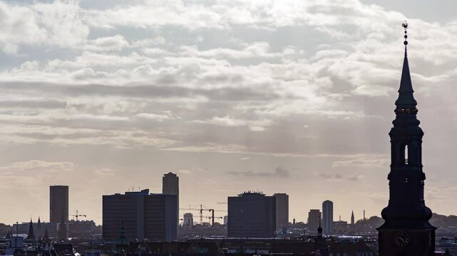 Lively daytime timelapse of Copenhagen's old town skyline with serene weather