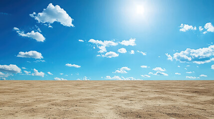 Vast, empty landscape with clear blue sky and scattered clouds, evoking sense of tranquility and openness