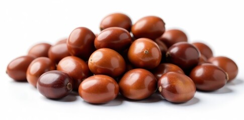 Obraz premium Pile of shiny brown chestnuts on white background, macro, closeup